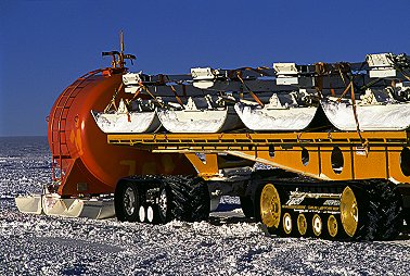 [DC_Trailers.jpg]
Upon departure from Dome C, the empty sleds are piled up to save on the number of things to drag behind. The only thing that the Traverse carries back down is the garbage produced by the station. Several containers filled with sorted trash will go back to Australia for disposal. Some containing organic or ferrous materials will be simply tossed into the ocean. The high oxygen content of the cold polar waters will ensure a quick disappearance.