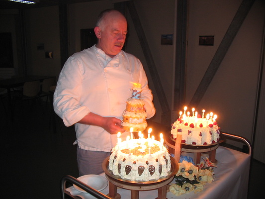 [20050729_047_JL_Vacherin.jpg]
Jean-Louis ready to blow his candles, with the singing cake in hand