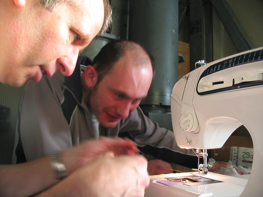 [20051104_034_ItalianFlagRepair.jpg]
Roberto and Emanuele trying to fix the torn (and only) Italian flag.