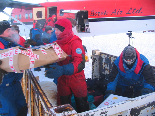 [20051105_089_Unload.jpg]
Michel, Claire, Christophe and others unloading the cargo: personal bags of the arriving people as well as fresh veggies and fruits and a surprise cake from Terra Nova !