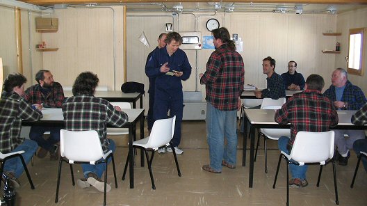 [PsychologySessionAll.jpg]
Psychology session at the summer camp, Roberto is directing in the middle, wearing his usual blue overalls.