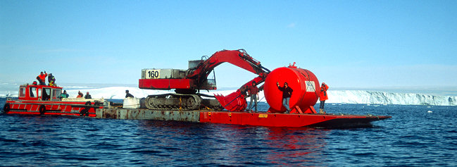 [SeaTruck.jpg]
The sea-truck ferrying heavy equipment to Cap Prudhomme, below D-10.