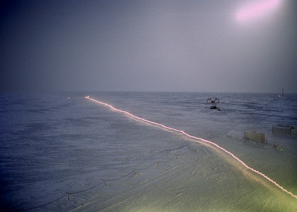 [WalkerTrail.jpg]
The same view during the winter night, done in long exposure to show Emanuele's lamp lighting his return trip.