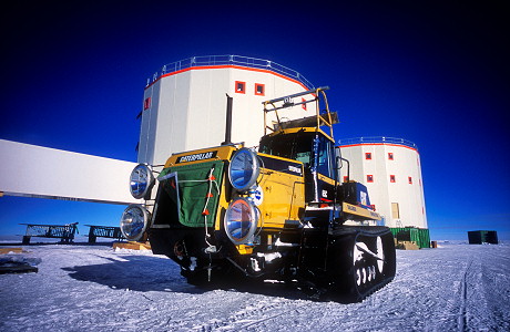 [ParkedChallengerConcordia.jpg]
Caterpillar tractor parked below Concordia. Although there's never any dark period during the summer campaigns when the Traverses occur, the powerful searchlights are necessary in whiteout conditions.