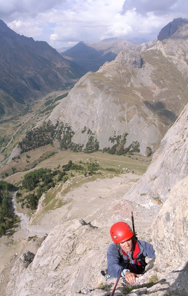 [20060912-VendangeTardiveVPano_.jpg]
Jenny on Vendange Tardive, one of the many long routes to be found in the Cerces range, here on the Lauzet. Roche Robert is the little lump on top of the other side and the main valley leads up to the Lautaret pass, in the background.