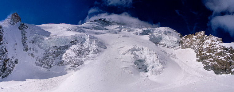 [20070507-EcrinsNorthFacePano_.jpg]
North face of the Ecrins, with Agostino right under the serac, if still some safe distance away. It takes only 2 minutes to cross under the serac, but it's a very nervous 2 minutes.