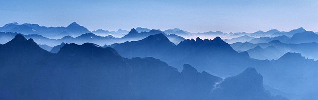 [MultipleSummits.jpg]
Multiple summit ridges towards the Italian border in the morning.