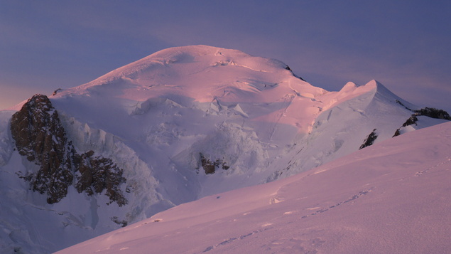 [20120602_044044_MtBlanc.jpg]
Sunrise on Mt Blanc, seen from the Gouter Dome. Later we'll ski right down the middle of that face, never mind the seracs.