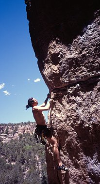 [ShelfRoad2_5.12.jpg]
The effect of light coming parallel to the rock, enhancing every tiny edge. That's me on a 5.11d at Shelf Road, Colorado.