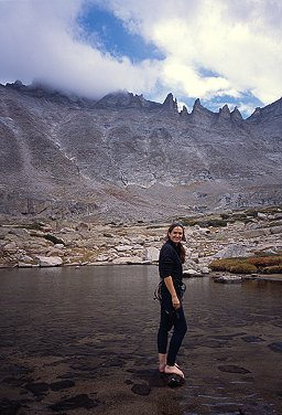 [SpearHead_Lake.jpg]
Jenny polluting the little lake near the base of Spearhead with her climber's feet...