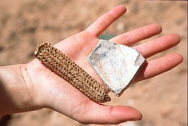 [CornPottery.jpg]
Various pieces of broken pottery at the base of an Anasazie dwelling.