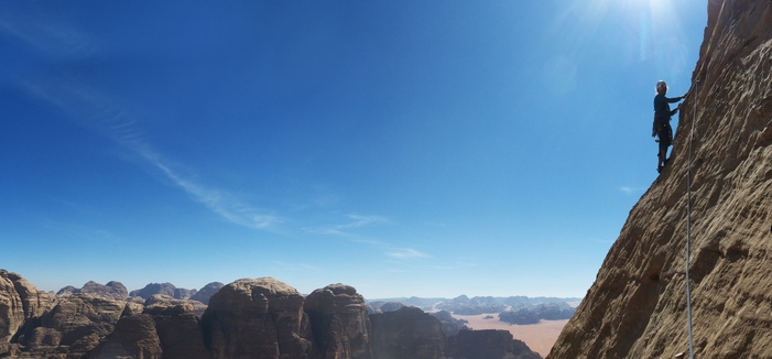 [20111109_104936_WisdomPillarPano_.jpg]
Traverse on the last pitch of the Wisdom Pillar. This is rated 6b, but is only one short well protected move. Most of the route is quite a bit easier than its rating suggests, and with the exception of the 1st pitch above the platform, it protects well.