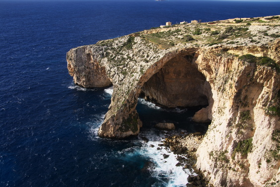 [20101103_101707_BlueGrotto.jpg]
The main arch of the Blue Grotto. The climbs are the the left edge, behind the arch itself, although there is a traverse that goes all the way around the foot of the arch. The only place where I've seen more arches is arguably in Arches National Park.