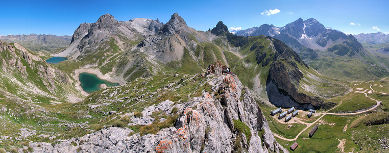 [20070804-154803_PicAiglePano_.jpg]
Panorama from the top of the routes, below the true summit. On the left behind the lakes at the Rochille pass is the Clarée valley leading down to Briançon, while on the right is the Galibier pass behind the northernmost summits of the Cerces.