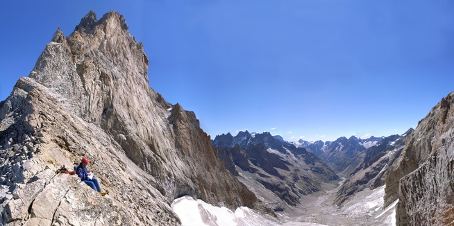 [20060905-1318-BrecheMeijePano_.jpg]
Reaching the Promontoire hut can be done easily from the very isolated village of La Bérarde, or from La Grave. In this case you need to avoid getting lost on the Enfetchores ridge, negotiate the crevasses of the Meije glacier and then sweat it off the poor rock leading to and back down the other side of the pass, from where this image is taken. The west face is clearly visible, leading to the 'Grand Doigt' above, but the classic route is the traverse taking the ridge visible on the right side of the mountain.