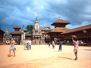 [Kite.jpg]
Kids playing with a kite.