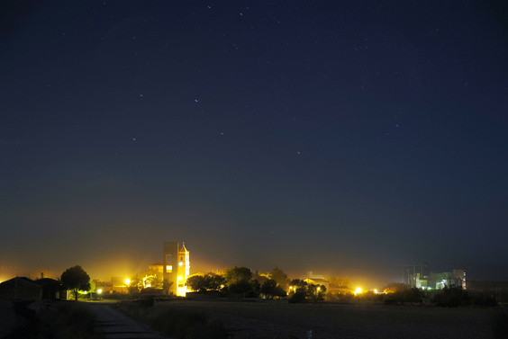 [20071028_213408_ArragonNight_.jpg]
Night above an empty village in dusty and smelly Aragon. The place was like a ghost town. We drove through it looking for a place to camp and all the windows were dark, with only one or two cars parked in the streets.