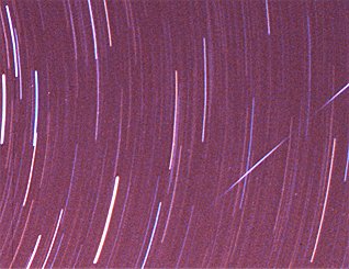 [ShootingStar.jpg]
A shooting star and a passing satellite caught by a long exposure photography.