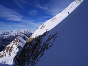 Traversing the very exposed descent of the Muraillette after a very long day