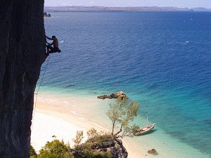 Climbing 'L'iles au tresor' (6b+) on the island of Nosy Anjombalova