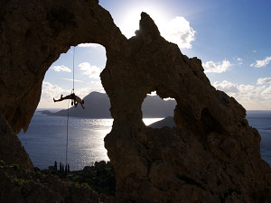 Rappelling down the triple arch of the Palace