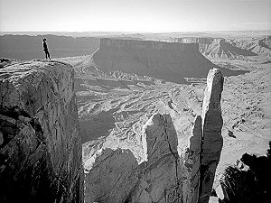 Climbers on the Priest as seen from the Rectory. Moab