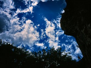 Sport climbers backlit on an overhang