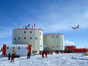 The Twin-Otter flying above the station 