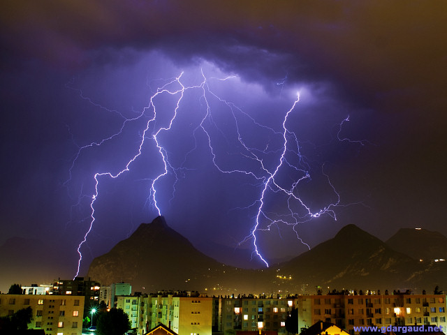 [20070524_220337_LightningGrenoble_.jpg]
I'd tried several times to take pictures of lightning, without much success. But now with an apartment high up with a full view on incoming thunderstorms, it's suddenly almost easy.