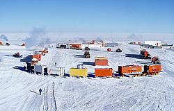 ArrivalTakeTurnComposite - Sled trains turning around in the 'parking lot' of the Dome C summer camp.
[ Click to go to the page where that image comes from ]