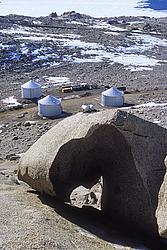 BTN-BoulderTanks - Fuel tanks and wind-carved boulder above Mario Zuchelli station (Italy).
[ Click to go to the page where that image comes from ]