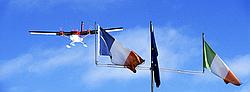 FlagOverflightPano_ - Twin Otter in landing approach above the flags of the Dome C summer camp.
[ Click to go to the page where that image comes from ]